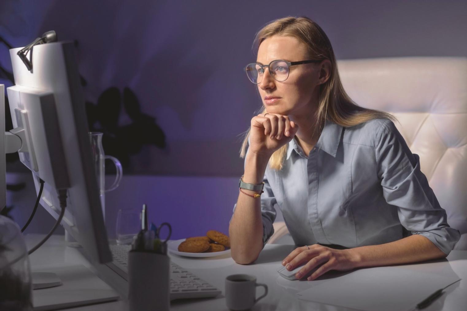 Design team collaborating on mobile app interface wireframes and user experience flows